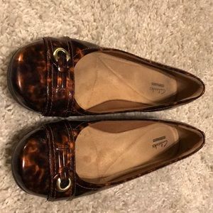 Clark’s metallic leopard print flats.